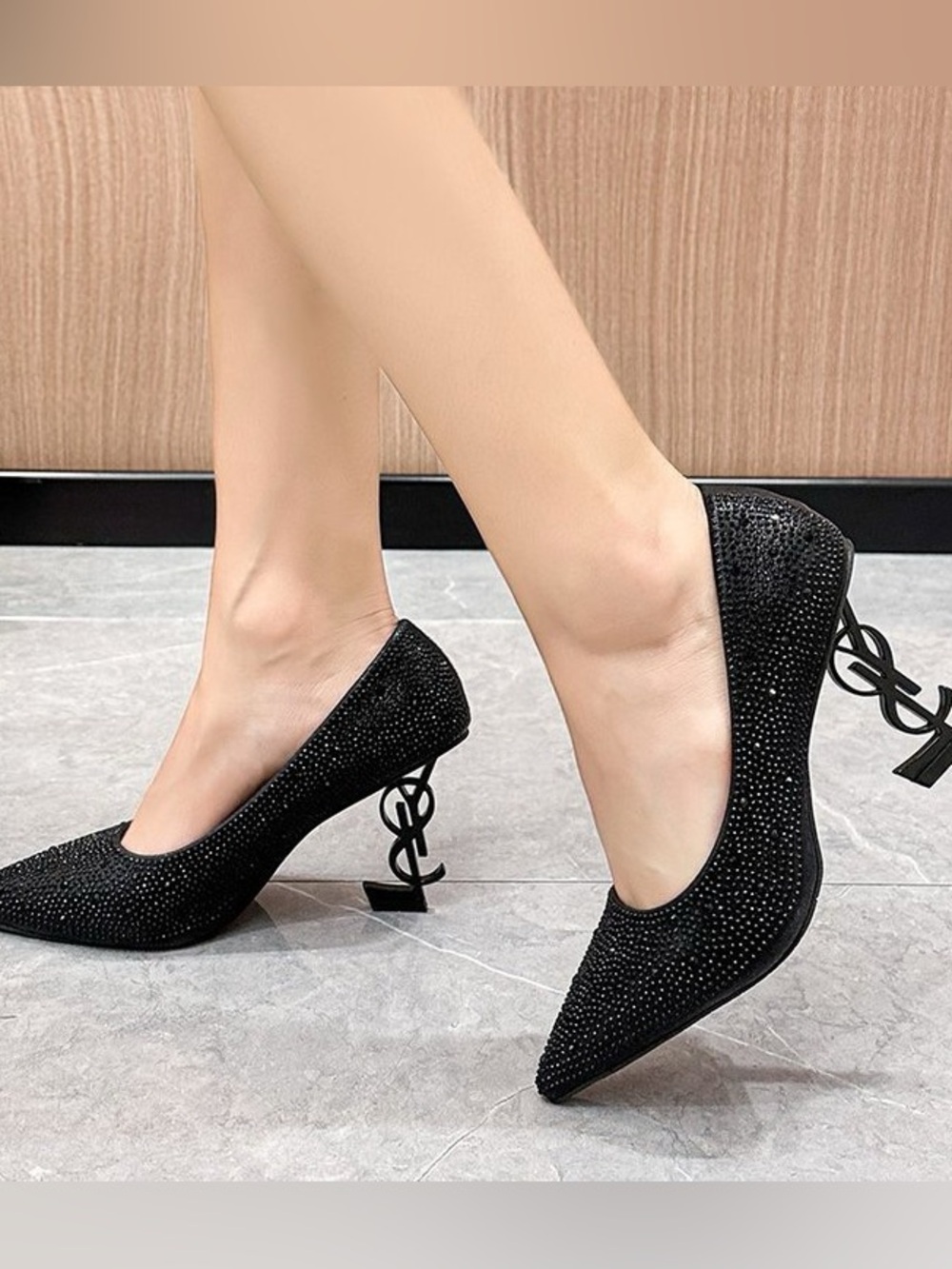 Black Crystal Pointed Pumps with Sculptural Logo Heel